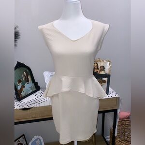 NWT cream color dress!! Beautiful back detail. Slight sparkle